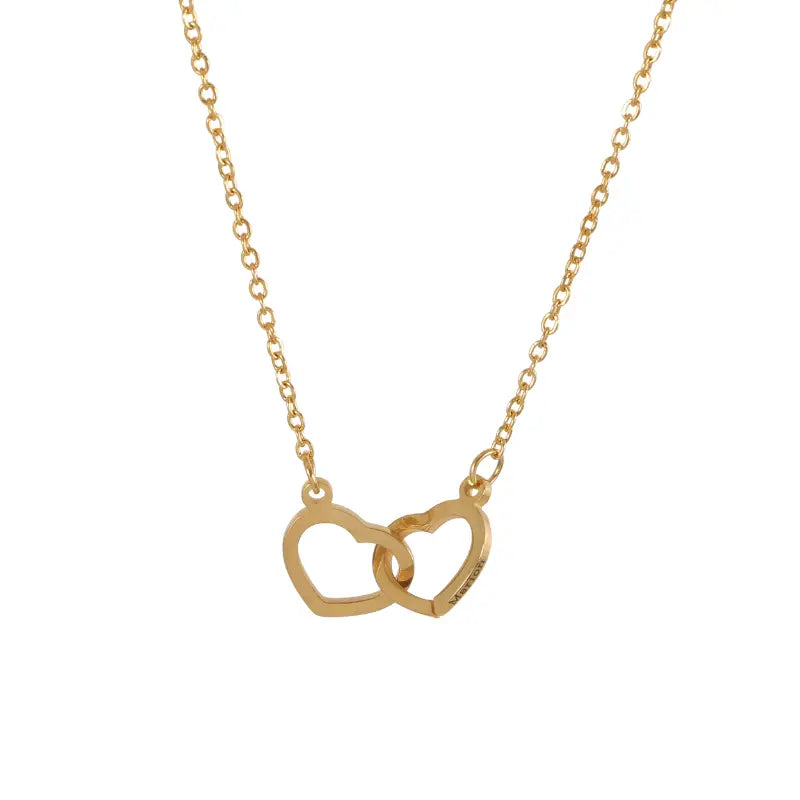 Collar de dos corazones grabados