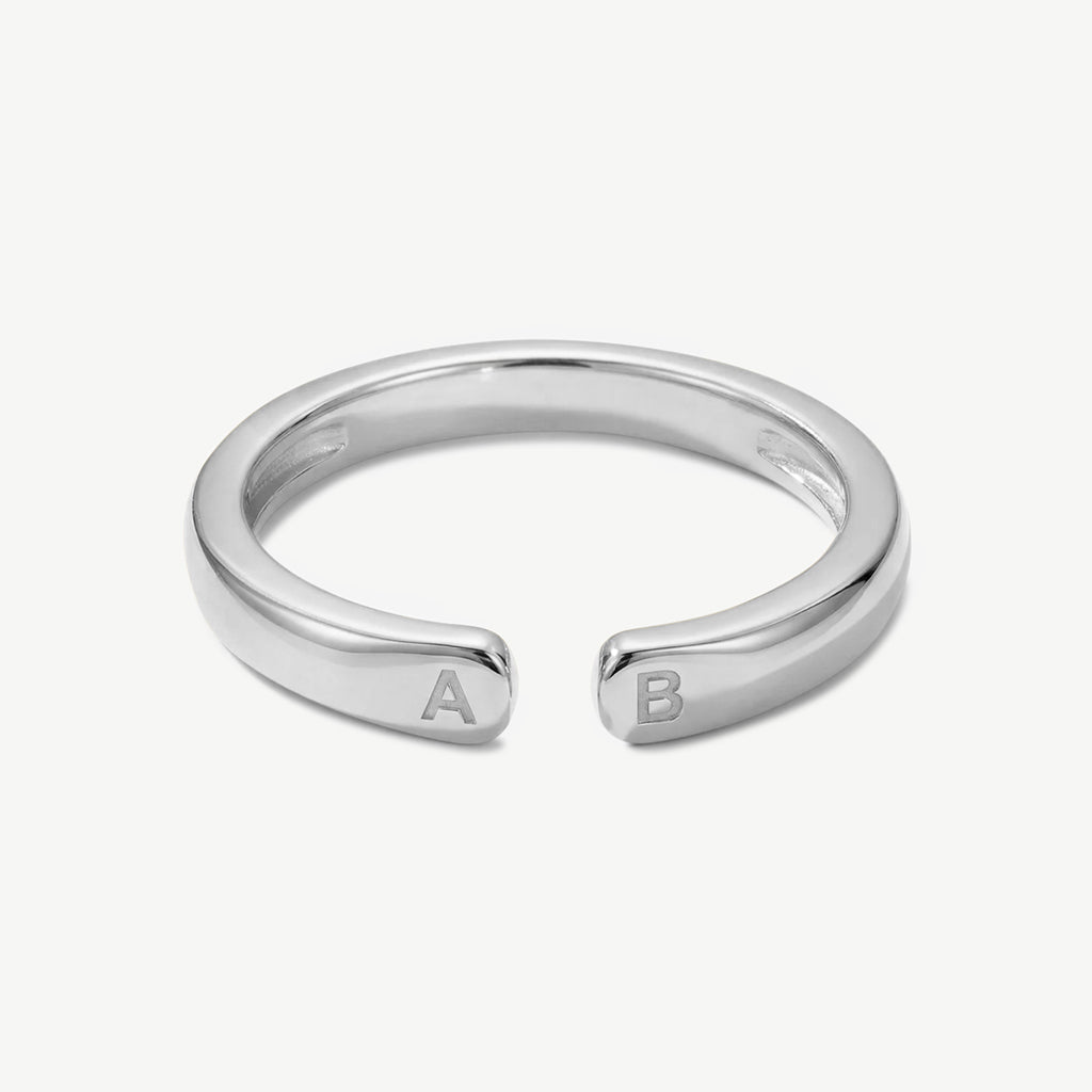 Anillo de inicial doble